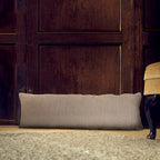 Brown weave Organic Cotton Door Draught Excluder in place behind door