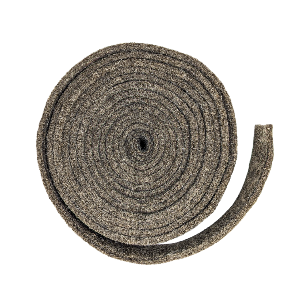 A coiled roll of textured gray felt or fabric insulation material, shown on a plain white background.